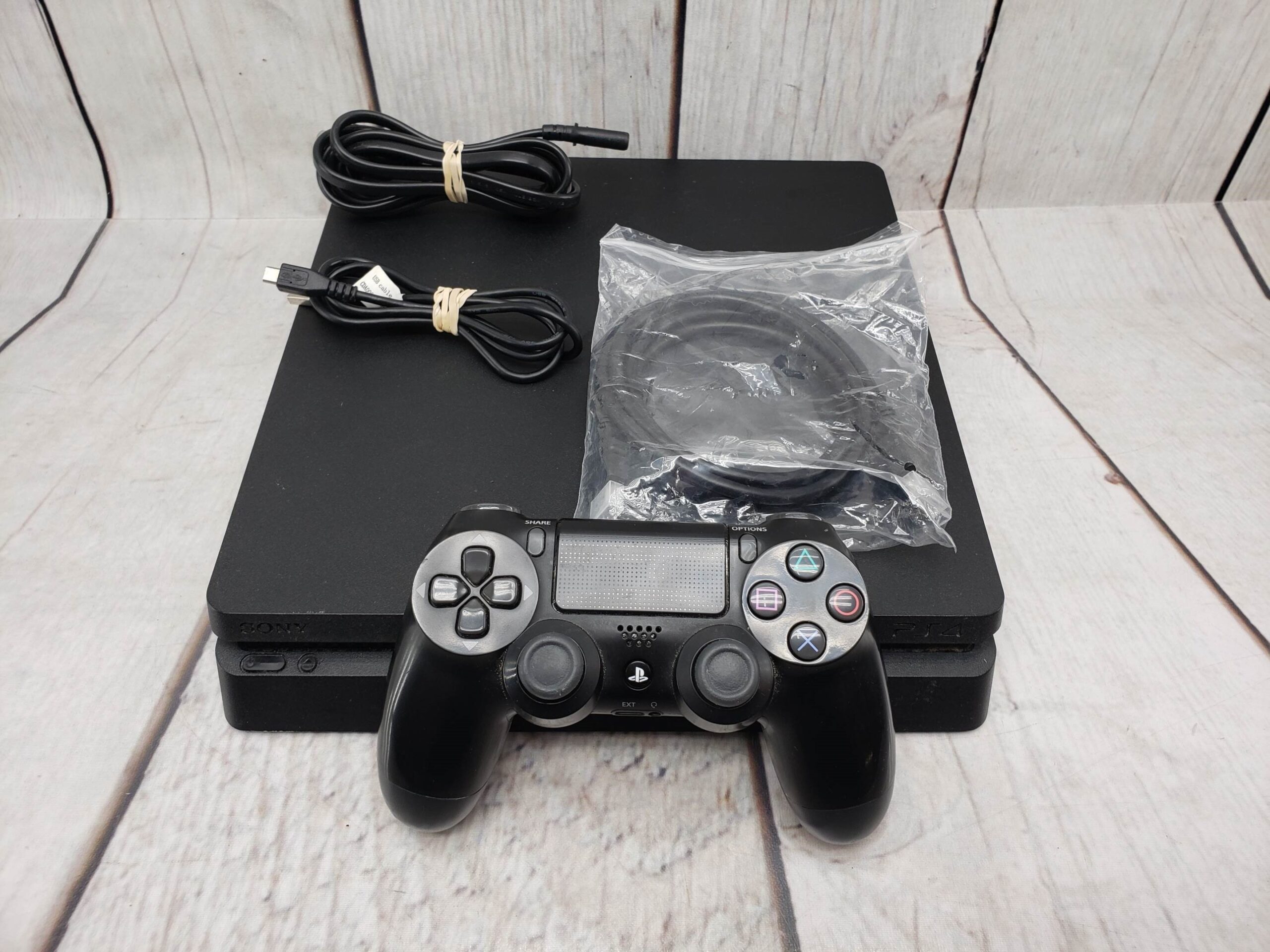 Sony PS4 Slim 500GB w/ one controller, power supply, cords, good 